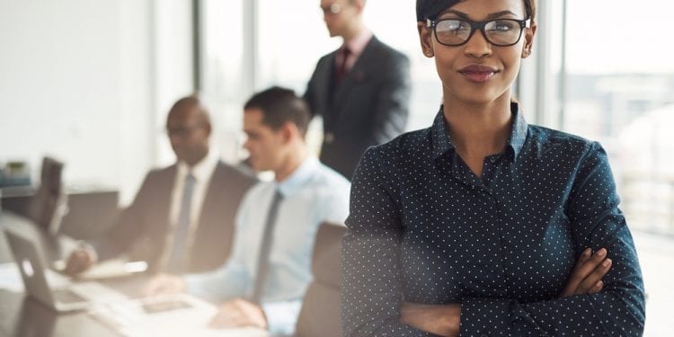 Professional in a with crossed arms standing - Avisen Legal
